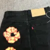 Denim tieners heren jeans ontwerper high street bloem denim krans zwart gewassen rechte jeans veelzijdige gedrukte bloemen neutrale jeans 521