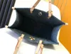 Denim blå tygväska transporterar mm axelväska medelhög handväska toppkvalitet duk läder modedesigner shopping väska mini månen handväska kullar 10a koppling plånbok m46871