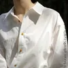 2024 Spring New Womens French White Shirt sciolto e sensazione versatile Piccola maniche lunghe uniche