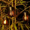 LED LUZ SOLAR LUZ DE JARDIM ANTERIOR Lâmpada impermeável e efeito de chama Ball luminárias solares penduradas na paisagem da lanterna decoração de quintal