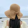 Chapeaux à bord large femmes chapeau soleil élégant femme avec dos bowknot détail ajusté la paille de plage anti-uv pour l'été