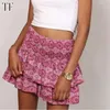 Robes sexy urbaines Summer en jupe plissée florale femme vintage imprimable jupe rose fash