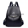 Backpack Style feminino novo zíper da moda simples e versátil de grande capacidade de grande capacidade atmosfera prática portátil para h240403 de saída