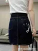 Designer Nanyou Springsummer New Dark régulière Loe Denim Jupe féminine haute taille Hip Mini jupe courte polyvalente 45HE