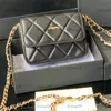 21S mode New Leather Diamond Women's Clamshell Luxury Handbag Creative Chain Metal Single Chain Crossbody Armpit axelväska Makeup Bag Designer Bag Purse 12.5