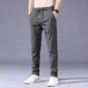 Pantalon masculin élastique de couleur unie molle douce élasticité applique coréa gris noir travail pantalon de marque masculine