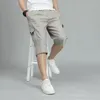 Pantaloncini da uomo Summer Solid Tasche con elastico abbottonato con cerniera ad alta vita con abbigliamento sportivo casual pantaloni sciolti in stile preppy formale