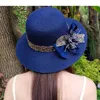 Wide Brim Hats Fashion Femmes Summer Sun's Sun Hat Bucket Beaut Beige Bowknot Fleurs Ruban Plat Top Paille Caps de plage Panama Cadeau