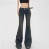 Kvinnors jeans amerikanska vintage streetwear kvinnor casual denim blossade byxor fast färg lösa låga midja klockbottenbyxor med fickor