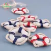 6sts Red Blue Mini Lifebuoys 1 12 Dollhouse Simulation Scale Model Lifebuoy Miniature Models Ornament Hem Desktop Decor Craft 240403