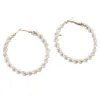 Nuevas joyas europeas y americanas con un sentido de temperamento de lujo y pendientes de perlas circulares El diseño de los aretes es nicho y versátil