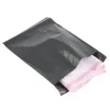 Buste 100pcs/lot borse da stoccaggio della busta nera borse di spedizione in plastica di spedizione impermeabile sacchetti per posta