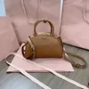 Top -Qualität Frauen Hobo -Tasche Handtasche Real Leder Umhängetasche Vielseitige Socialite Designer Crossbody Bag Reißverschluss Kleine Knödelbeutel mit vollem Paket