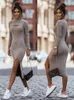 Femmes automne hiverntes tricotées longues midi robe solide bureau dame pullover bodycon slim manche sexy creux out pull 240403