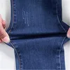 Kvinnors jeans sträcker smala fit kvinnlig mager bomullspennor på våren och sommaren