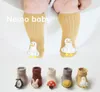 Новые детские носки милые мультипликационные куклы Tube Tube Nops Nonslip Dot Glue осень и Winter8366015