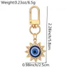 Tornario blu Evil Eye Keechain in lega di rinestone Sun Floro Round Ring Dare Donne Donni uomini colorati Cavali Cavalchi Araganna BASSO CUSCHLE ACCESSIONI CHIAVI CHIAVE BUT