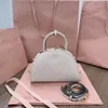 Top -Qualität Frauen Hobo -Tasche Handtasche Real Leder Umhängetasche Vielseitige Socialite Designer Crossbody Bag Reißverschluss Kleine Knödelbeutel mit vollem Paket