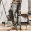 Temperamento alla moda, stile americano, jeans pesanti artigianali, gamba dritta ampia da uomo, abiti da lavoro a gamba larga traforati, pantaloni casual da mendicante