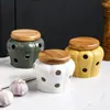 Opslagflessen keramische knoflook pot creatief deksel holle kaarslampenkap 2colors candybox. Gember huishouden