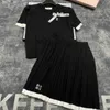 MIMU Early Spring New Girl Style Diamond Grid Short Sleeved Knitted Top+pleated Half Skirt Knitted Set