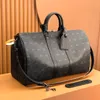 M41424 M56714 Keepall 45 50 55 Borse da viaggio da viaggio da donna in pelle di fiore da design a tracota spalla di moda Luxurys per borse da ginnastica per palestra manganello