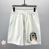 Shorts masculinos Castelo de céu estrelado Letra imprimindo shorts esportivos de rua para homens e mulheres calças casuais de algodão J240402