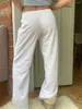 Pantalon féminin blanc décontracté élastique et taille creuse flor