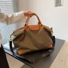 2024 Nouveau sac fourre-tout de sport décontracté femmes sacs à bandoulière sac de voyage de grande capacité sac à bandoulière fourre-tout sac de sport femmes fitness grand sac 10a