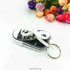 Mini -imitatie helder goud poeder canvas schoenen sleutelring hanger sportschoenen bagage auto hanger creatief cadeau