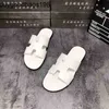 Designer Designer Summer Slifors Spirit Guy Europe Station Flip versatili Flip Versione coreana Tide Brand Beach Shoes Youth SAN ha Logo T0VA