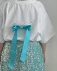 Girls Back Ribbon Bows Applique T-shirts Kids Sequins Princess Jupe 2024 Été Enfants Loose Short à manches Tops Z7496