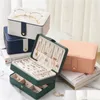 Caixas de jóias Brincos caixa de armazenamento de colar de couro Mtifuncional Customização 230505 Drop Delivery DHJ4U