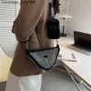 Designer des sacs d'épaule American Classic Trend Style Diamond Womens New Simple Fashion grande capacité Rigiane Messenger Triangle Messenger