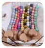 10 färger Nytt kärlek Heart Wood Pacifier Clip Baby Diy Creative Pacifier Chain Cartoon Silicone Pärlor Trä napphållare Z22364689234