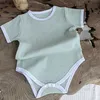 Rompers New Summer Baby Boy Boy fille garçon garçon tricot noir pyjamas Jumpsuit Coton Vêtements côtelés Tricots Stretch Newboron ROMPERS PLAYSU L240402