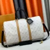 Designer Luxunhão Duffle Bag Denim Travel Bolsa Bolsa de bagagem de couro ombro Crossbody Crossbody de grande capacidade