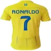 23/24 AL NASSR FC Maglie da calcio Ronaldo Mane Brozovic 2023 2024 Home Away CR7 KIDS KIT Martinez Talisca Ghislain Konan Otavio Vincent Aboubakar Men Shirt