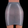 Abiti sexy urbani lucidi Micro Mini Mini Skirt Club Sexy Weer Vedi attraverso gonne Donne sexy Skirt Hip Scava trasparente forma a cavità stretta attiva 2443