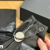 Lüks Cowhide Bag Kadınlar Sırt Çantası Tasarımcı Omuz Çantası Metal Rozet Fermuar Çantası Mini Kurbağa Desenli Torba Desenli Kapitone Çanta Satın Alma B