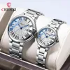 Dawn Roman paar Kalender blauw roze witte stalen band waterdichte gloed Classic Ball Quartz Watch