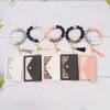Wholesale of new silicone bead bracelets, keychains, Korean velvet tassels, PU pickup bags, pendants, bracelets, keychains for foreign trade