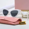 MUI SUN GLASSES Designer Miui Okulary przeciwsłoneczne zagraniczne kocie oczy męskie i damskie zdjęcia ulicy