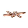 Designermärke TFFS Simple Temperament Knotring för kvinnor 925 Sterling Silver Plated 18k Gold Diamond Twisted Bow