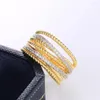 結婚指輪Huitan Fancy Cross Twine Twine Women Ring Gold Color with Micro Crystal Zircon Stone Delice Lady Fashion Jewelry