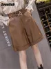 Shorts pour femmes en cuir faux pux pu avec celtre 2024 Automne Hiver High taille élégante pantalon de jambe large lâche poches
