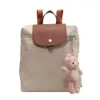 Branche de marque French Trendy Femme 2023 Nouvelle tendance Fashion Poids Réduction Porte Voyage Portable Sac à dos de voyage de grande capacité