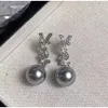 ユニークな文字真珠2023新しいトレンディなニッチデザイン、ハイエンドのイヤリング、気質、および女性のイヤリング