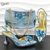 Kleiderschuhe Himmelblaue Frauen und Taschen, die modische afrikanische Damen Pumps mit Handtasche High Heels Sandalen Escarpins Femme MM1150