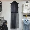 Giubbotti da donna primavera estate donne a metà lunghezza della catena di paillettestri di paillettestri giubbotti in maglia nera di denim nero collare senza maniche